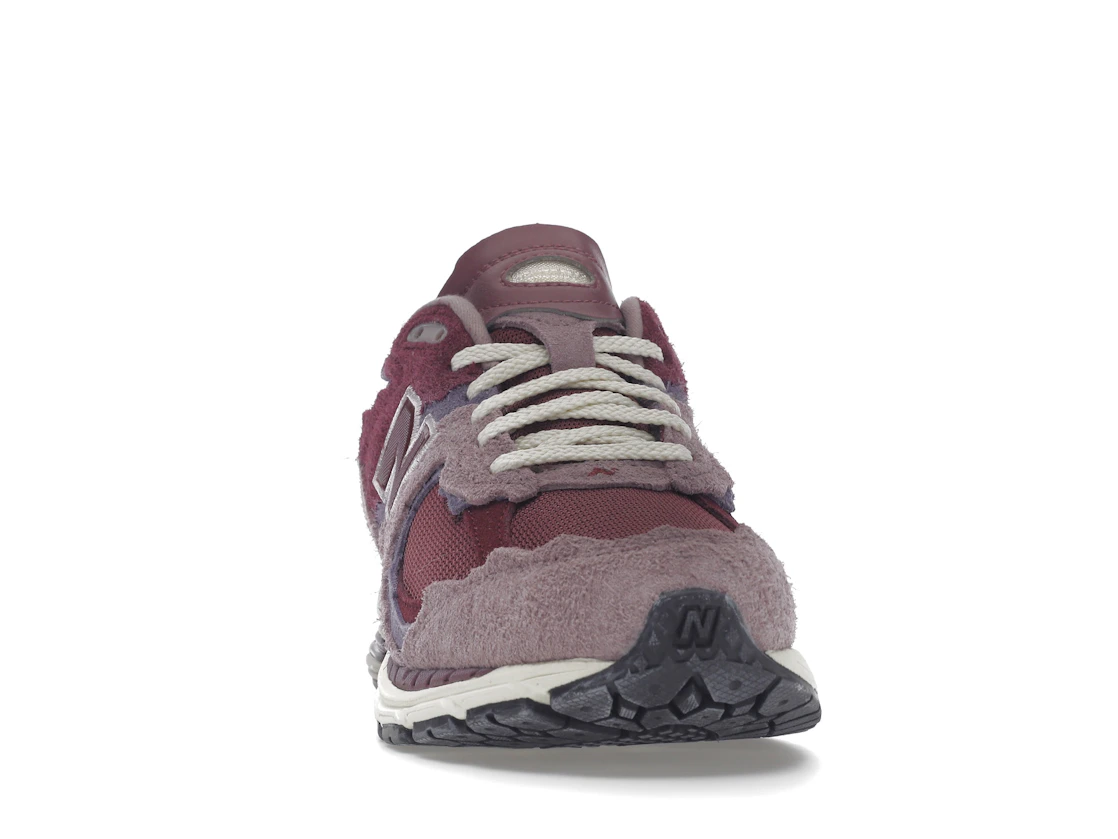 Vue 9 de New Balance 2002R Protection Pack Pink