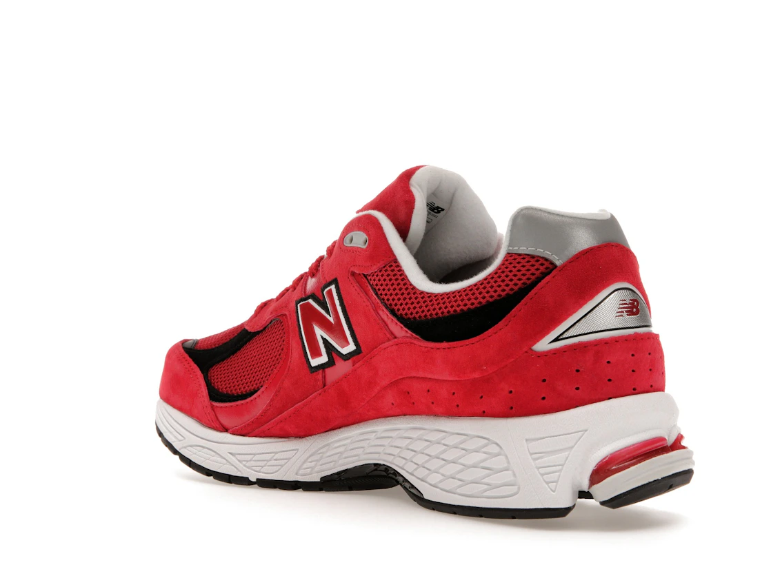 Vue 24 de New Balance 2002R Team Red