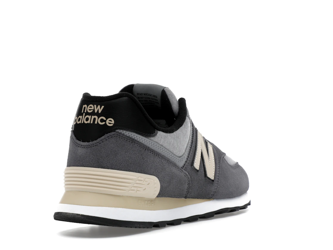 Vue 31 de New Balance 574 Grey Day Magnet (2024)