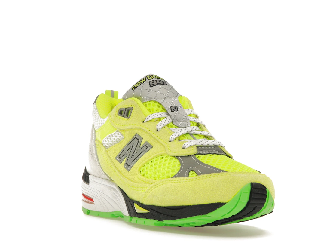 Vue 7 de New Balance 991 MiUK Aries Neon