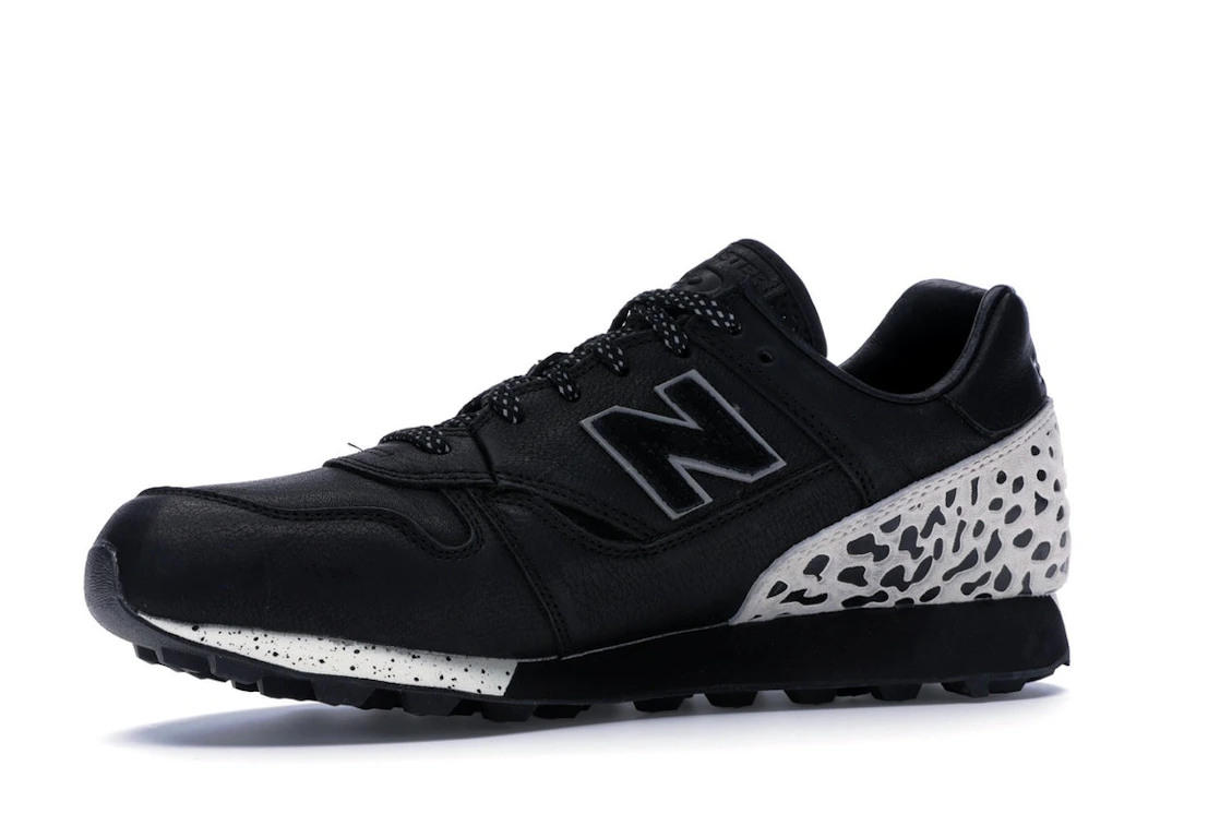 Vue 17 de New Balance Trailbuster Undefeated Black