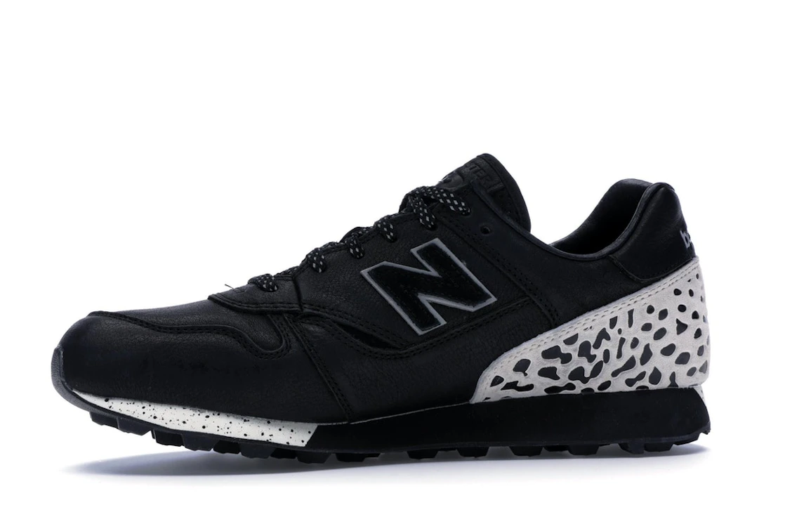 Vue 18 de New Balance Trailbuster Undefeated Black