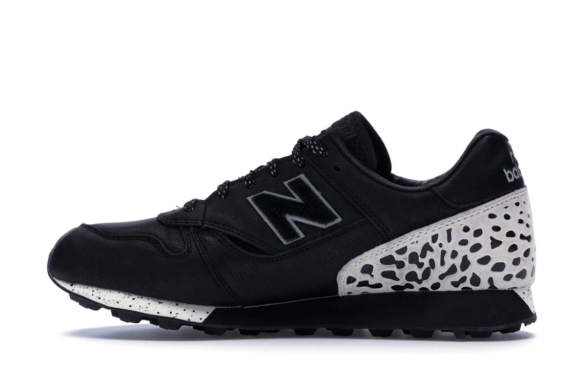 Vue 20 de New Balance Trailbuster Undefeated Black