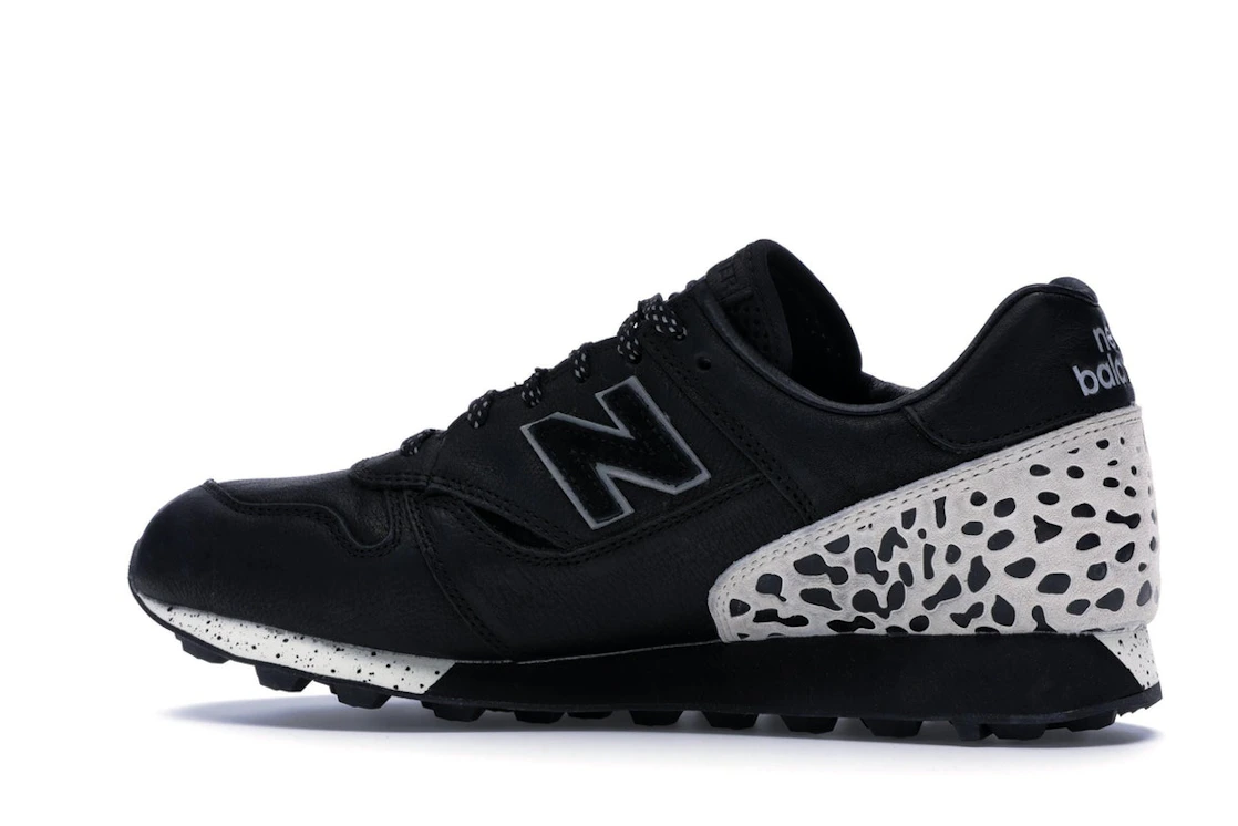 Vue 21 de New Balance Trailbuster Undefeated Black