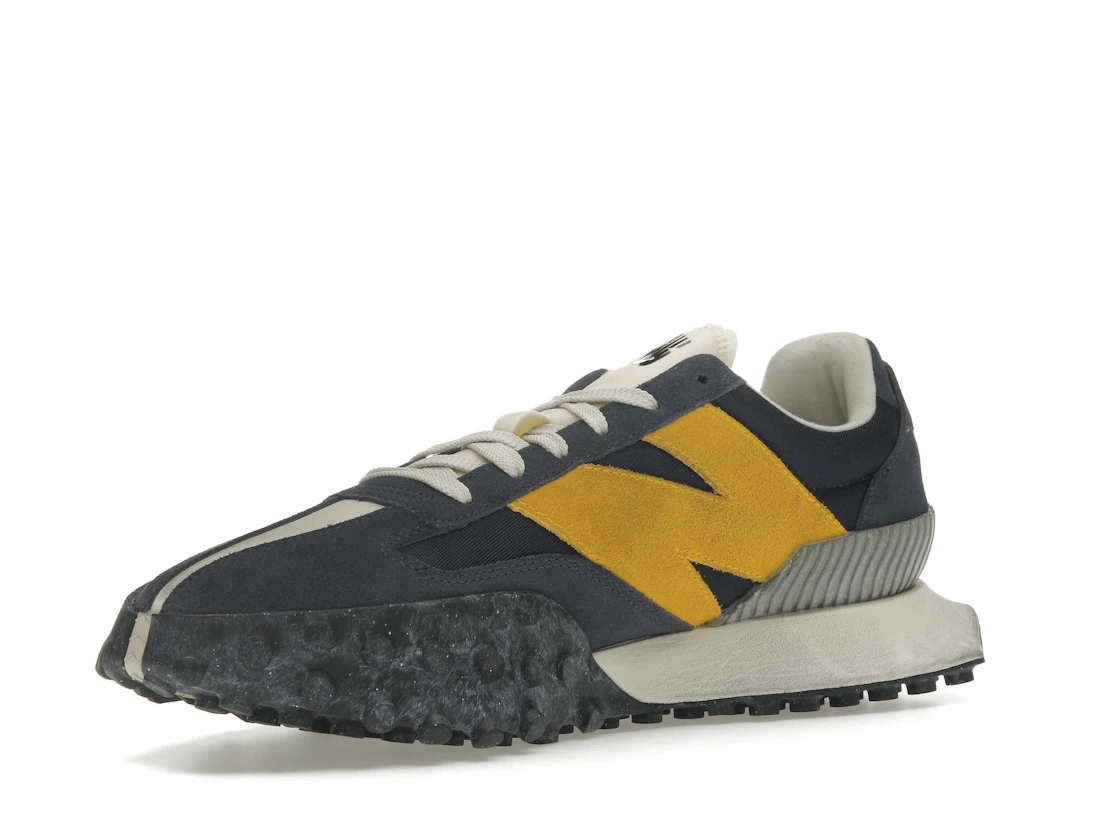 Vue 15 de New Balance XC-72 Navy Gold
