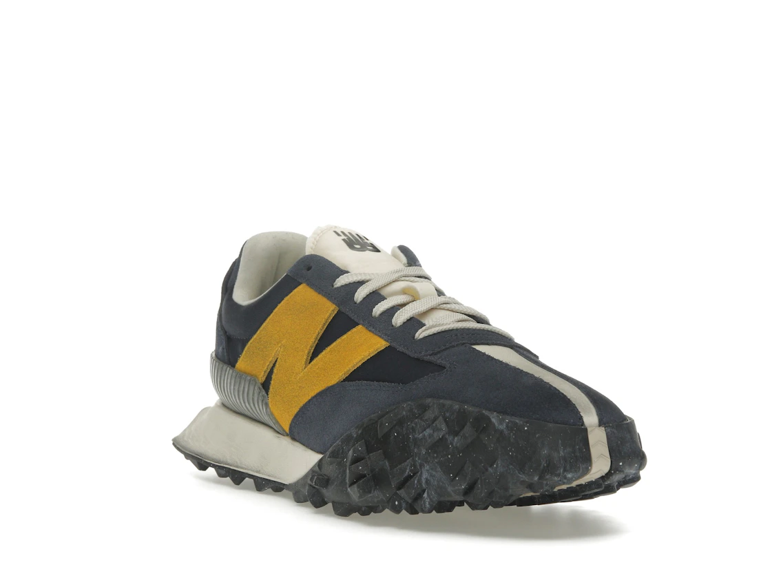 Vue 7 de New Balance XC-72 Navy Gold