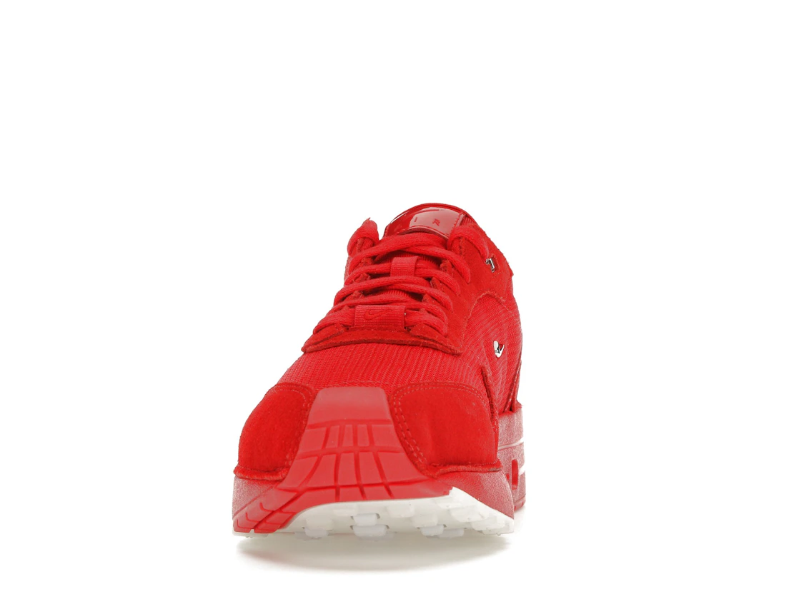 Vue 11 de Nike Air Max 1 '86 Jacquemus Mystic Red 