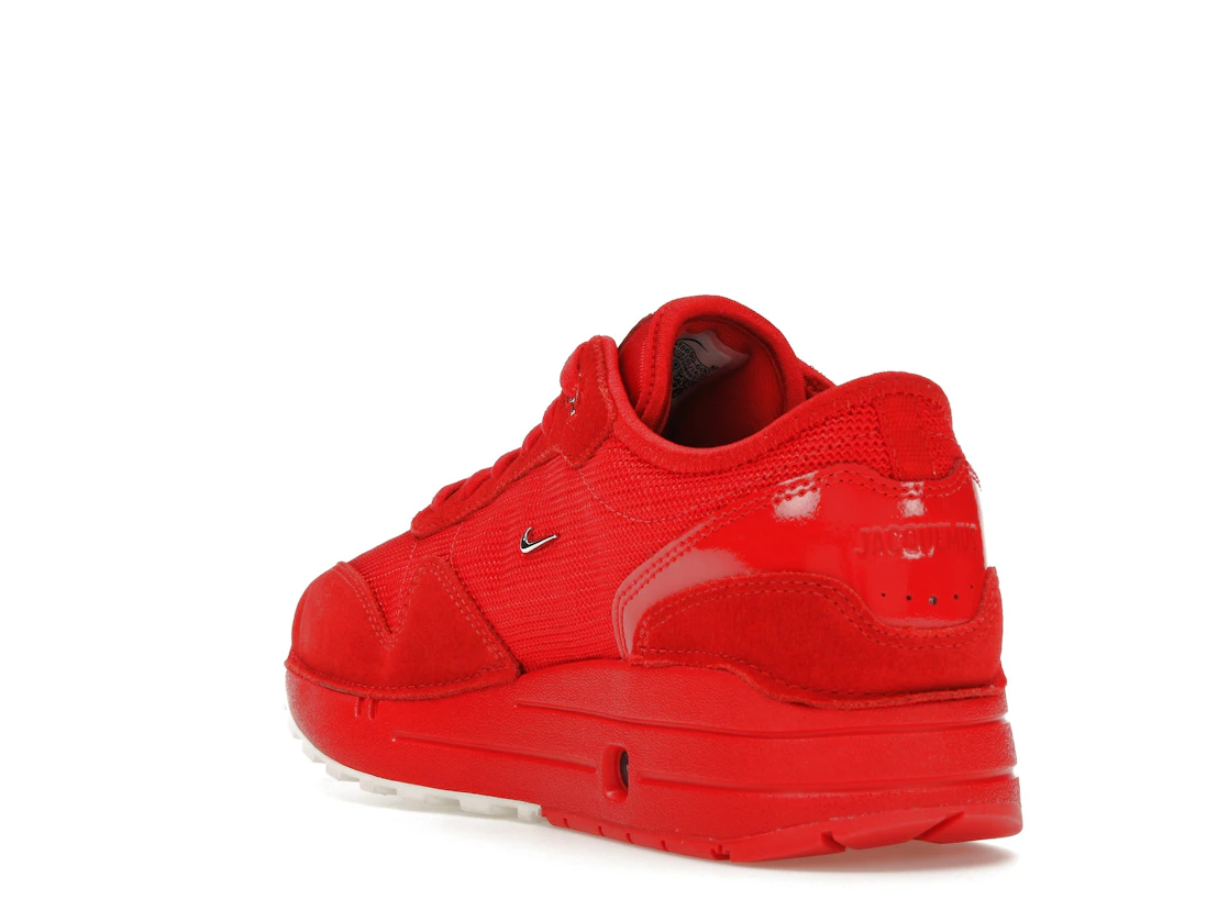 Vue 25 de Nike Air Max 1 '86 Jacquemus Mystic Red 