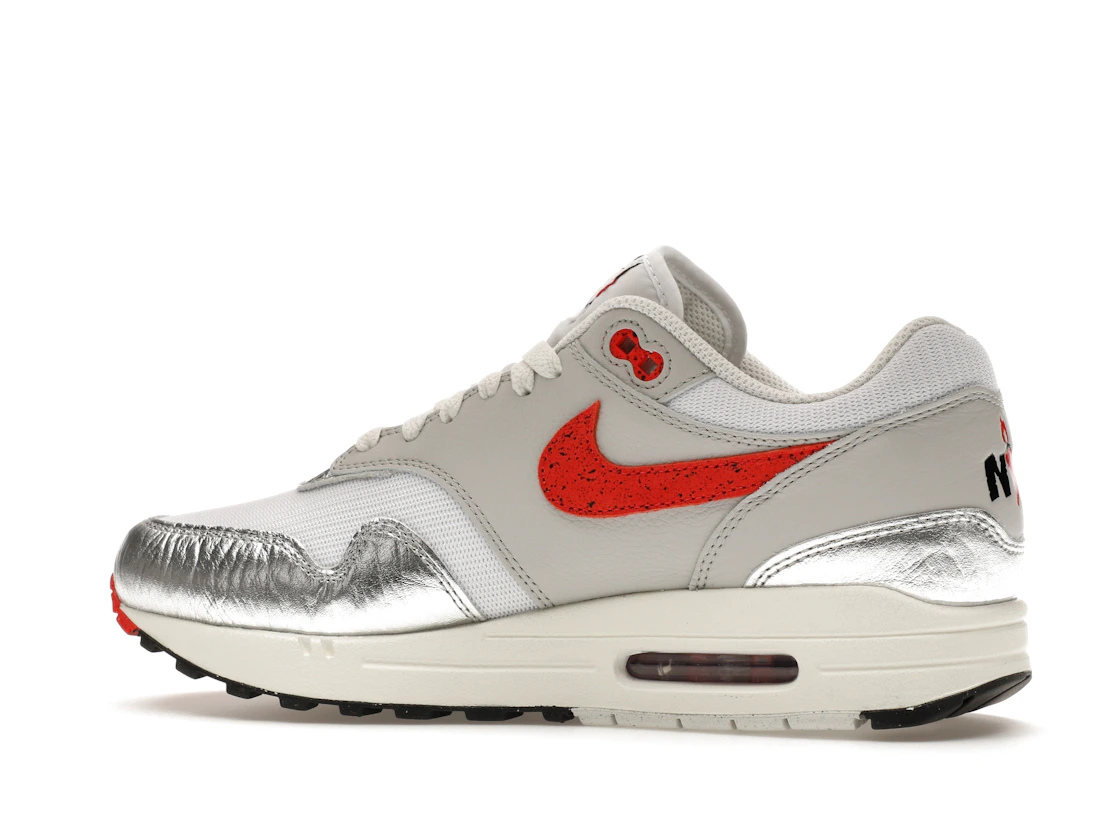 Vue 21 de Nike Air Max 1 PRM SE Hot Sauce