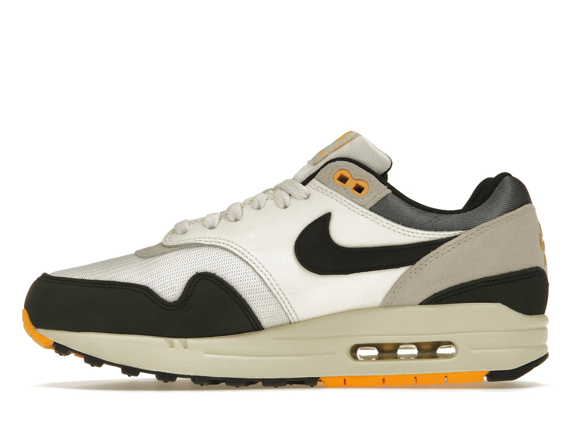 Vue 19 de Nike Air Max 1 Athletic Department Light Bone University Gold
