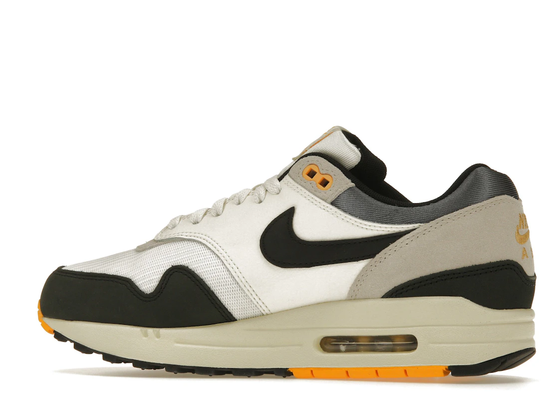 Vue 21 de Nike Air Max 1 Athletic Department Light Bone University Gold