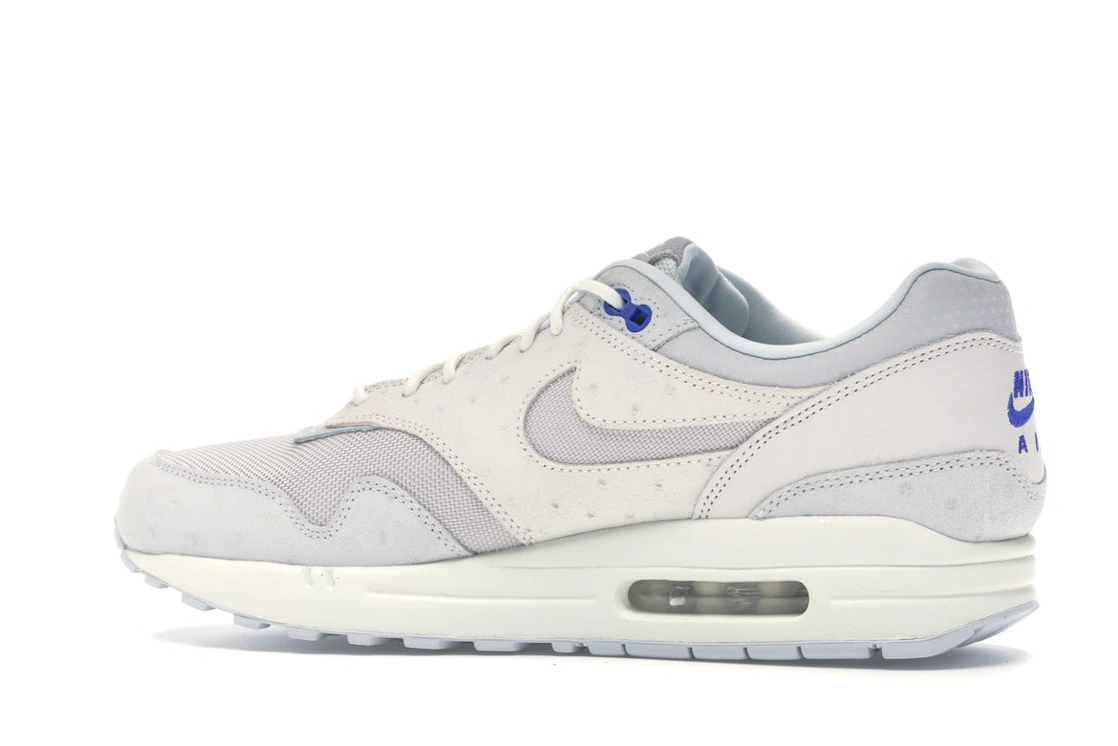 Vue 21 de Nike Air Max 1 Pure Platinum Racer Blue
