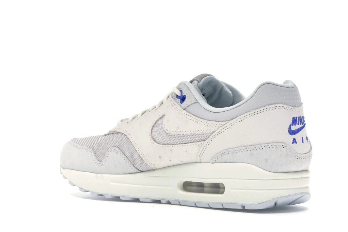 Vue 23 de Nike Air Max 1 Pure Platinum Racer Blue