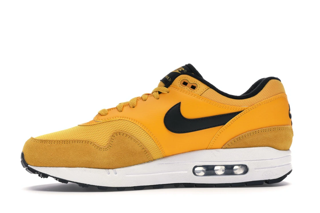 Vue 18 de Nike Air Max 1 University Gold
