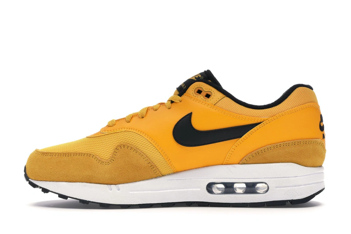 Vue 19 de Nike Air Max 1 University Gold
