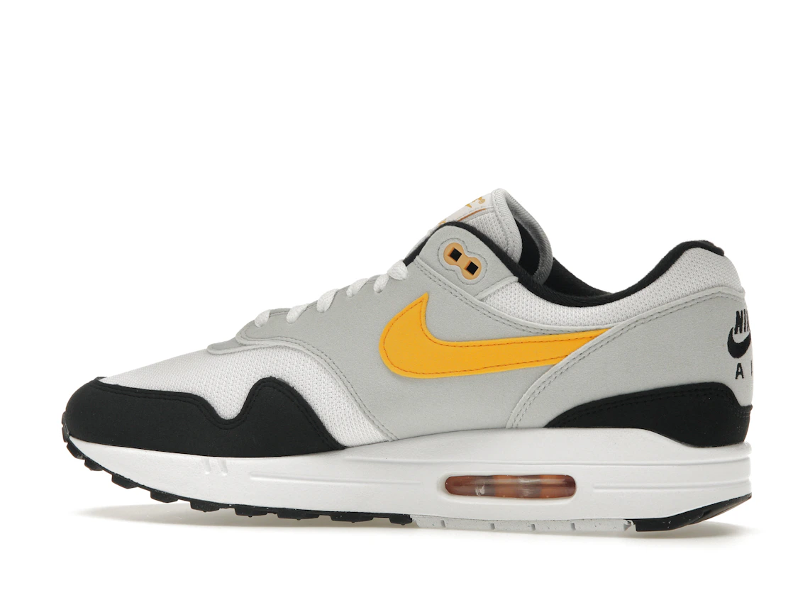 Vue 21 de Nike Air Max 1 White University Gold
