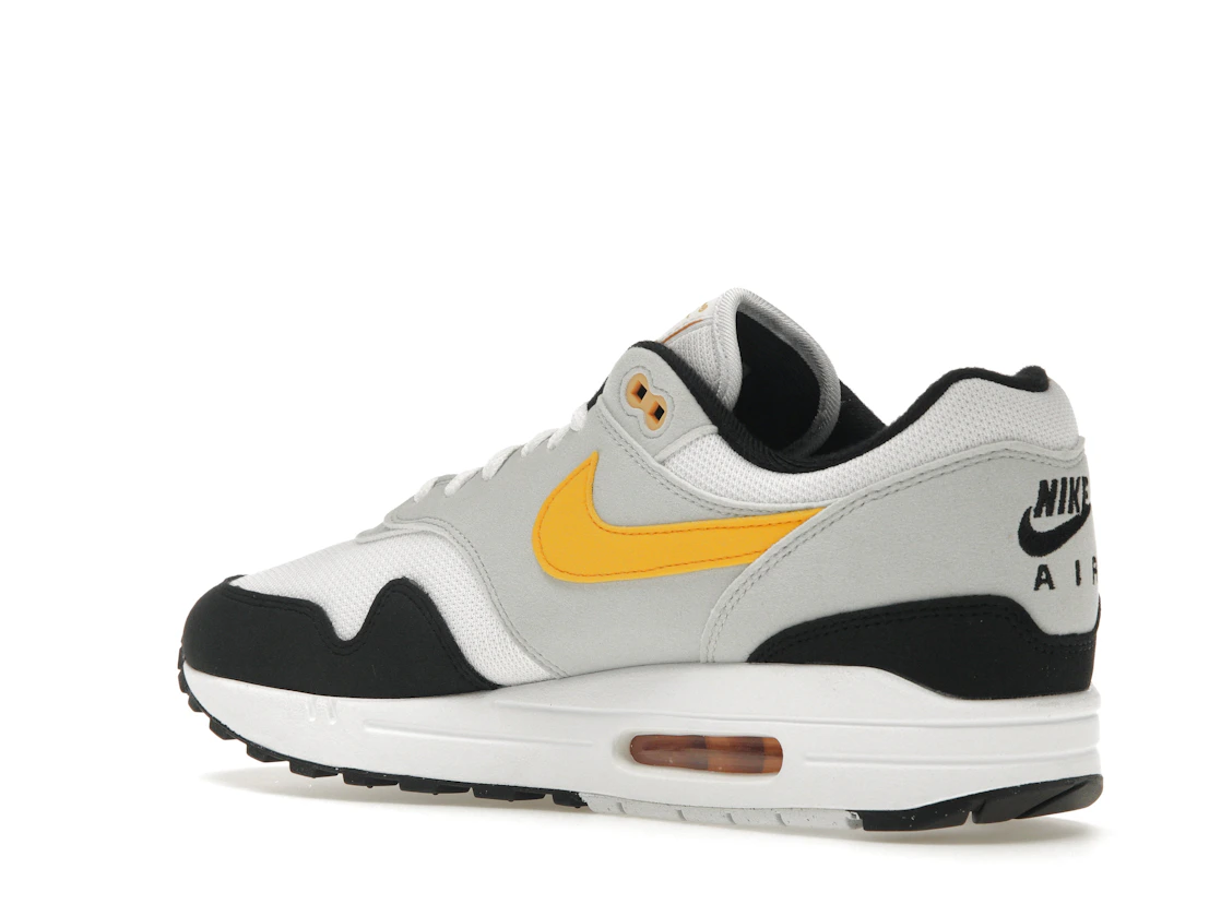 Vue 23 de Nike Air Max 1 White University Gold