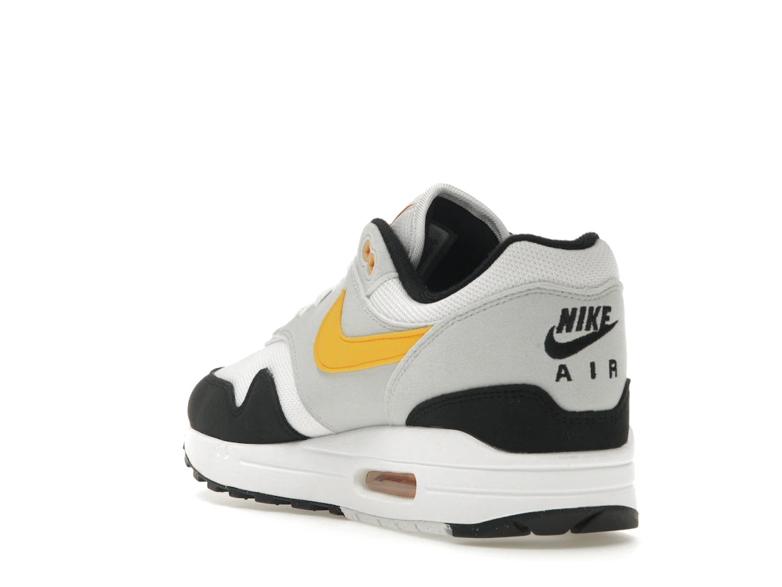Vue 25 de Nike Air Max 1 White University Gold