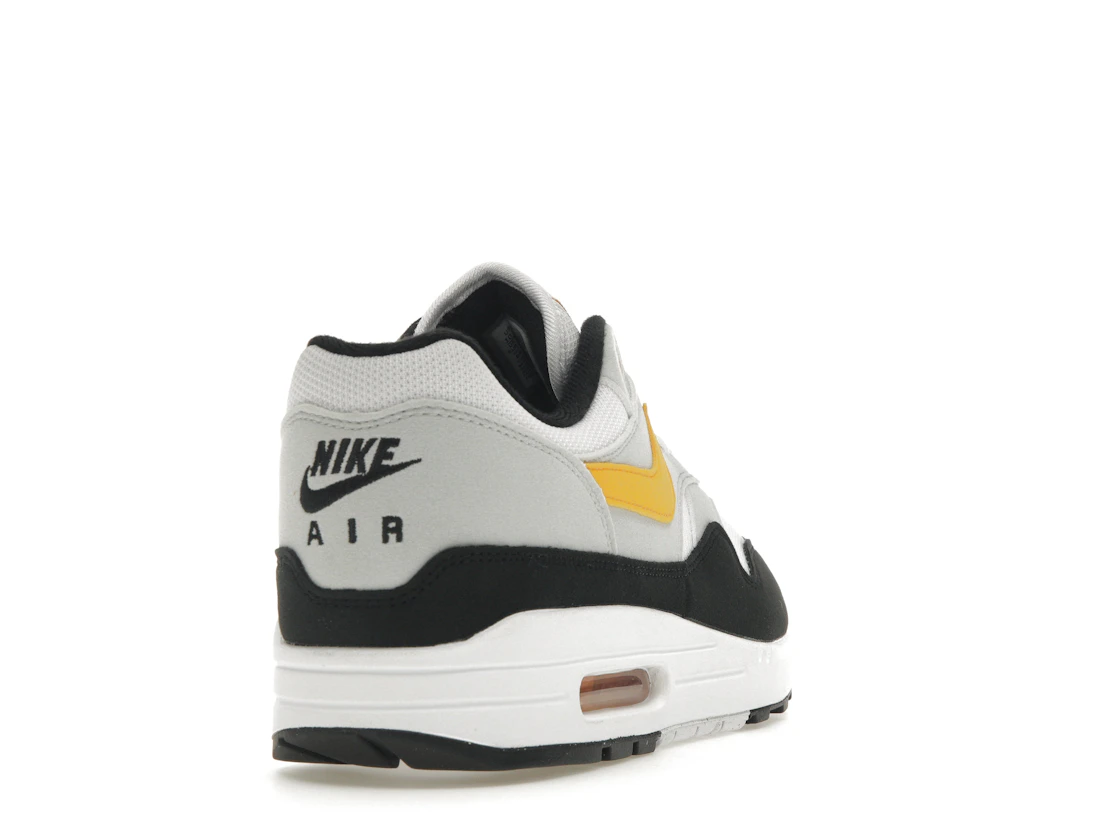 Vue 30 de Nike Air Max 1 White University Gold