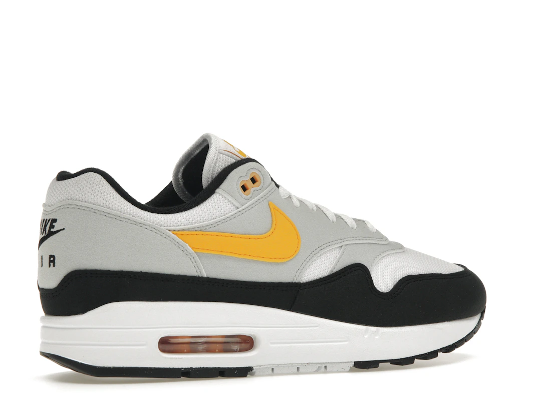 Vue 34 de Nike Air Max 1 White University Gold