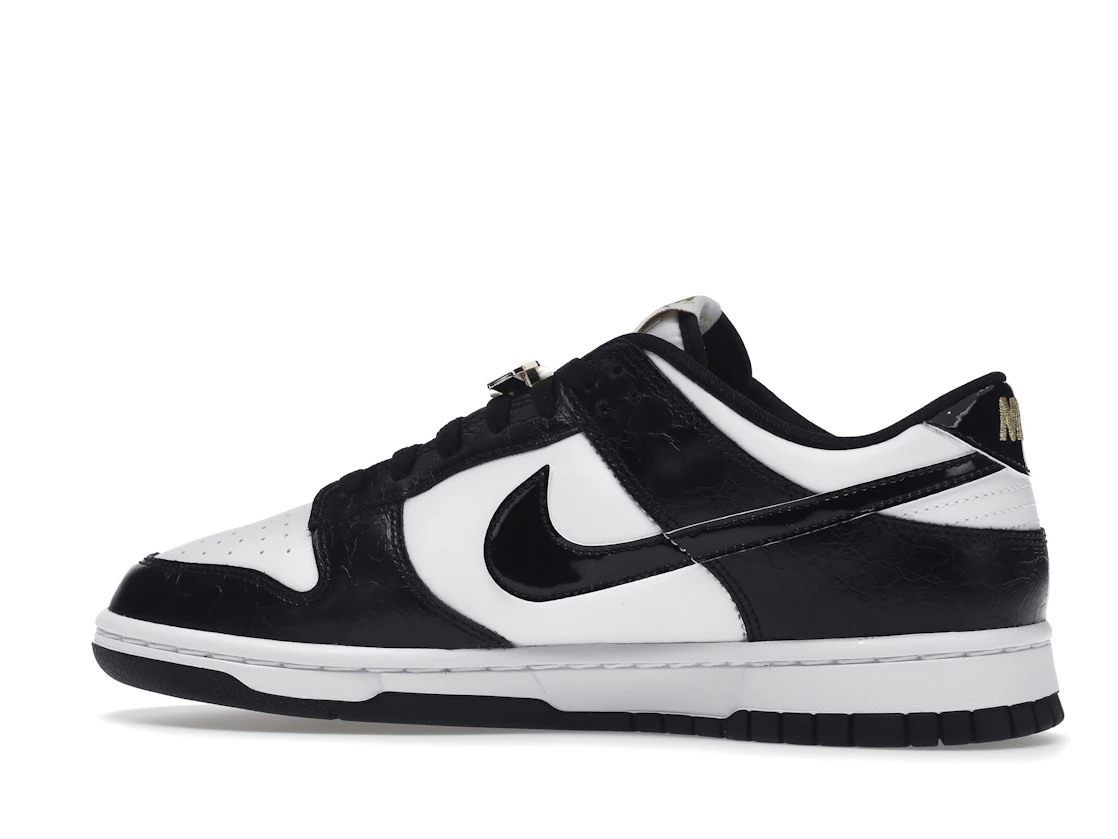 Vue 21 de Nike Dunk Low SE World Champs Black White