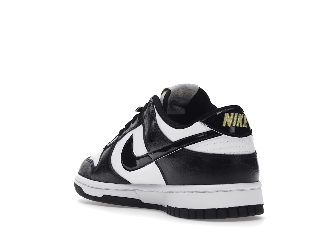 Vue 25 de Nike Dunk Low SE World Champs Black White