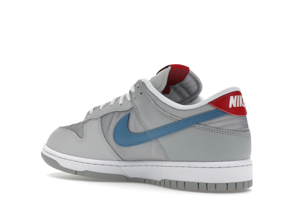Vue 23 de Nike Dunk Low Silver Surfer (2024)