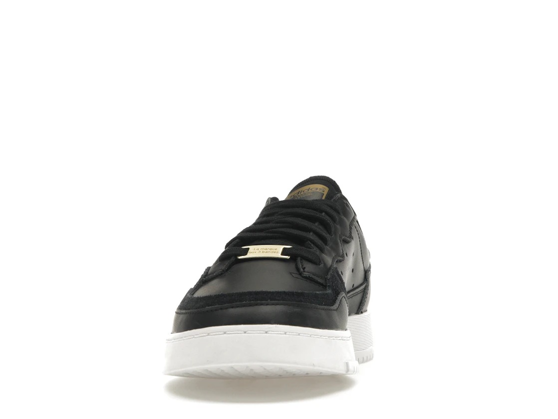 Vue 11 de adidas Supercourt Core Black White