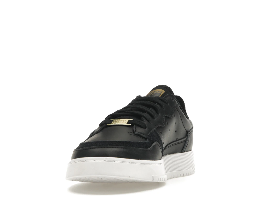 Vue 12 de adidas Supercourt Core Black White